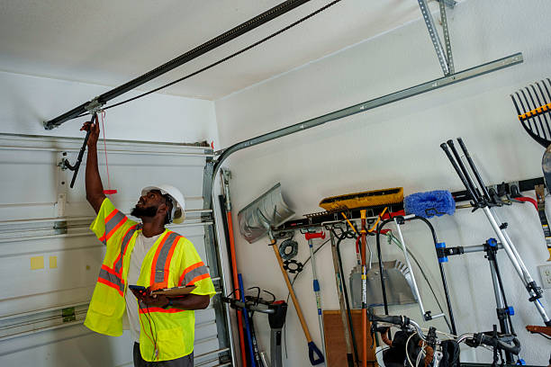Professional Garage Door Panel Replacement technician working in Ankeny, IA
